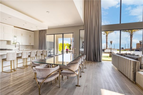 Dining room, Interior, Kitchen, Living room, Recessed Lighting, Water, Wood Texture Flooring