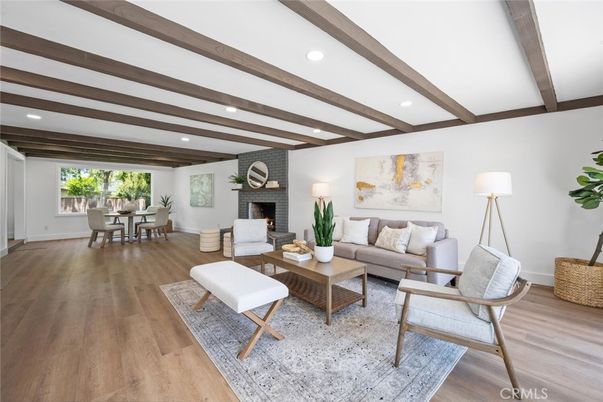 Dining room, Fireplace, Interior, Living room, Recessed Lighting, Wooden Beams, Wood Texture Flooring