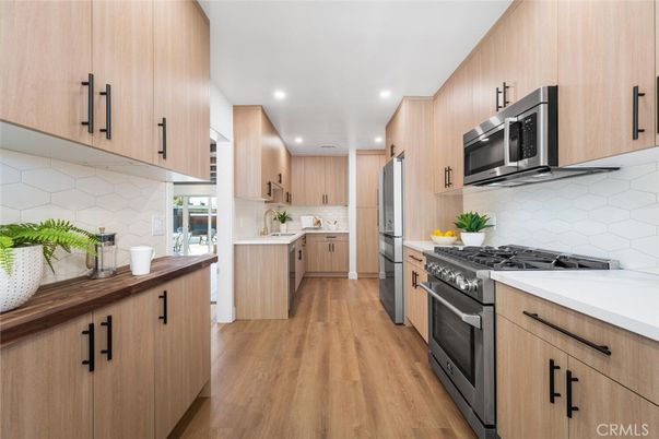 Interior, Kitchen, Recessed Lighting, Stainless Steel Appliances, Wood Texture Flooring