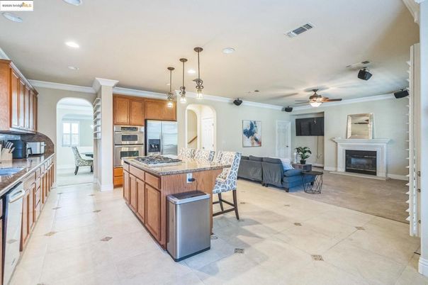 Fireplace, Interior, Kitchen, Living room, Pendant Lights, Recessed Lighting, Stainless Steel Appliances