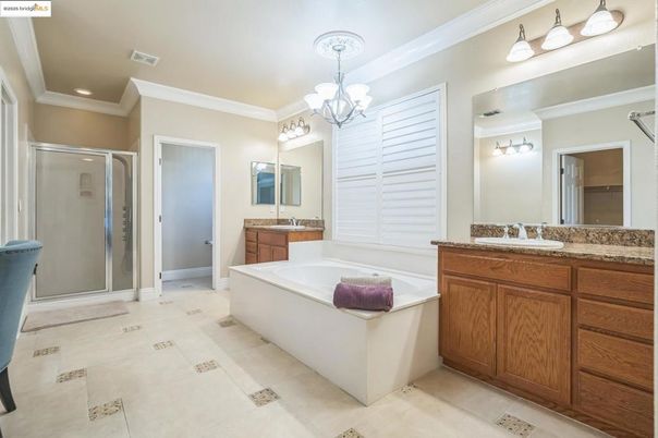 Bathroom, Chandelier, Dual Sink Vanities, Glass Shower, Interior, Recessed Lighting