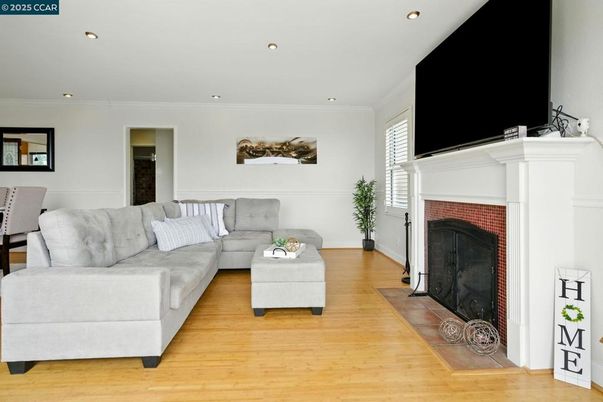 Fireplace, Interior, Living room, Recessed Lighting, Wood Texture Flooring