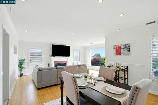 Dining room, Fireplace, Interior, Living room, Recessed Lighting, Wood Texture Flooring