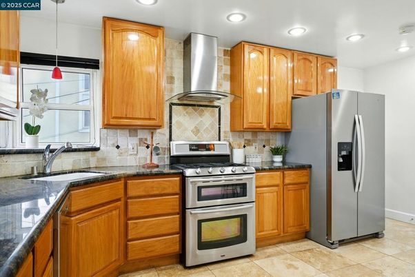 Interior, Kitchen, Recessed Lighting, Stainless Steel Appliances, Tile Countertops