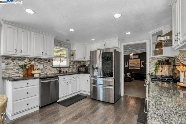 Interior, Kitchen, Recessed Lighting, Stainless Steel Appliances, Wood Texture Flooring