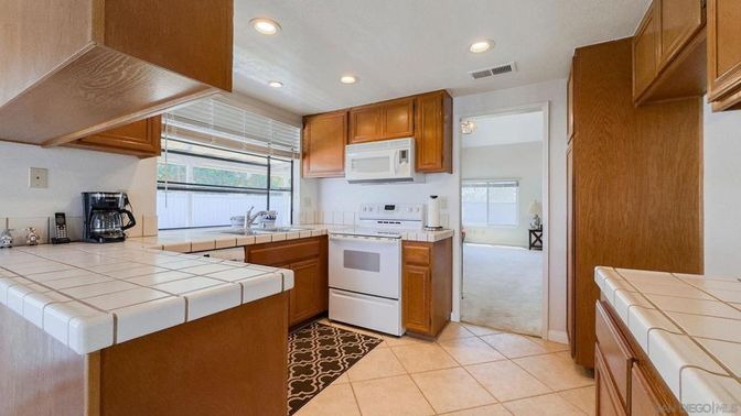 Interior, Kitchen, Recessed Lighting, Tile Countertops