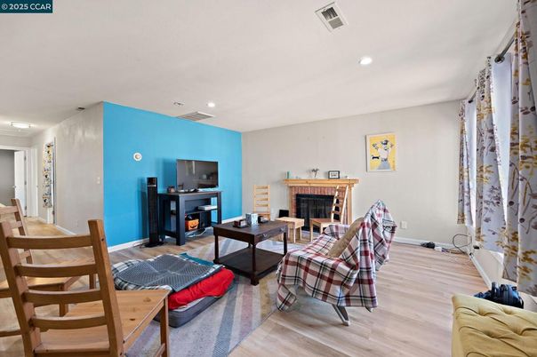 Fireplace, Interior, Living room, Recessed Lighting, Wood Texture Flooring