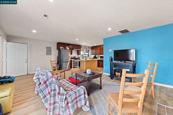Dining room, Interior, Kitchen, Recessed Lighting, Stainless Steel Appliances, Wood Texture Flooring