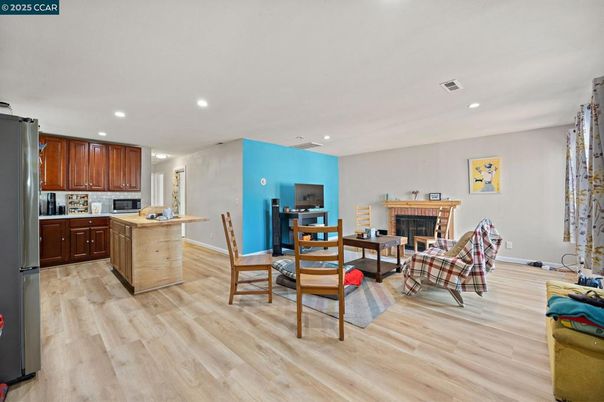 Dining room, Fireplace, Interior, Kitchen, Living room, Recessed Lighting, Wood Texture Flooring
