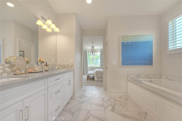 Bathroom, Chandelier, Dual Sink Vanities, Interior, Marble, Recessed Lighting