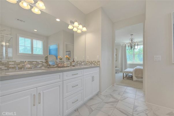Bathroom, Chandelier, Dual Sink Vanities, Interior, Marble, Recessed Lighting