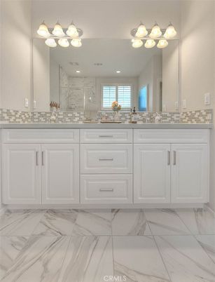 Bathroom, Dual Sink Vanities, Interior, Marble, Marble Walls, Recessed Lighting