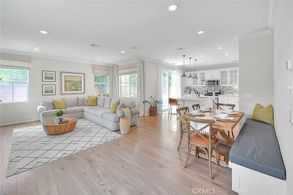 Dining room, Interior, Kitchen, Living room, Pendant Lights, Recessed Lighting, Stainless Steel Appliances, Wood Texture Flooring