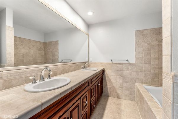 Bathroom, Dual Sink Vanities, Interior, Recessed Lighting, Tile Countertops