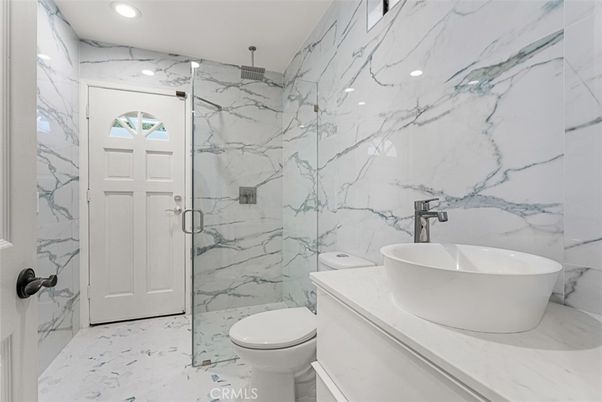 Bathroom, Free Standing Baths, Glass Shower, Interior, Marble, Marble Walls, Recessed Lighting