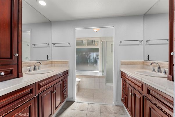 Bathroom, Dual Sink Vanities, Interior, Recessed Lighting, Tile Countertops