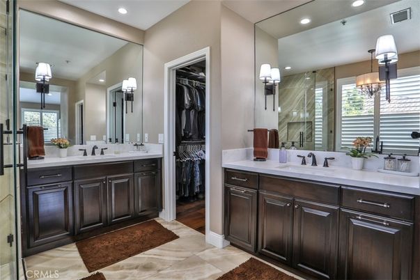 Bathroom, Dual Sink Vanities, Glass Shower, Interior, Recessed Lighting, Wood Texture Flooring