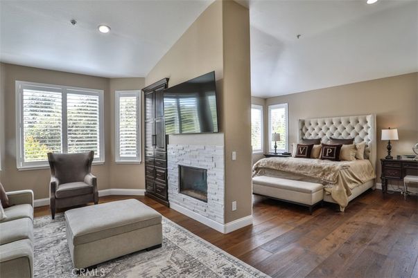 Bedroom, Fireplace, Interior, Recessed Lighting, Wood Texture Flooring