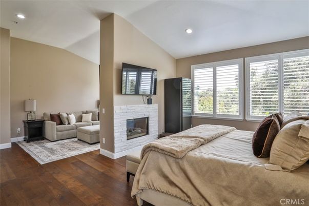 Bedroom, Fireplace, Interior, Recessed Lighting, Wood Texture Flooring