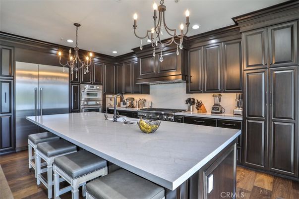 Chandelier, Interior, Kitchen, Recessed Lighting, Stainless Steel Appliances, Wood Texture Flooring