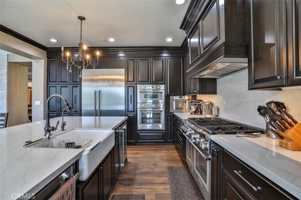 Chandelier, Interior, Kitchen, Pendant Lights, Recessed Lighting, Stainless Steel Appliances, Wood Texture Flooring