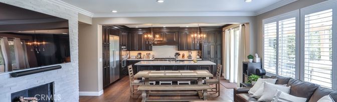 Fireplace, Interior, Kitchen, Pendant Lights, Recessed Lighting, Stainless Steel Appliances, Stone Walls, Wood Texture Flooring