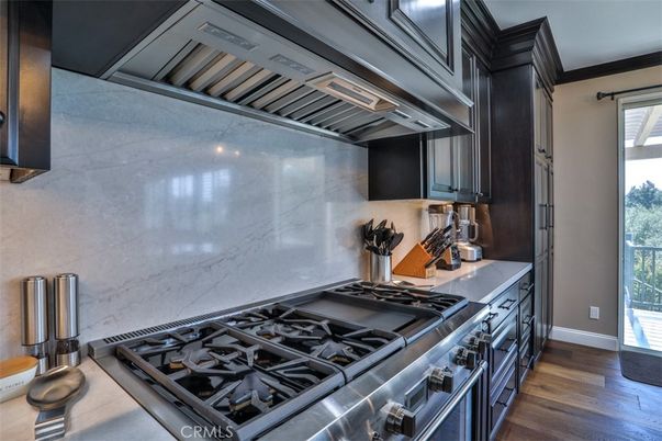 Interior, Kitchen, Marble Walls, Stainless Steel Appliances, Wood Texture Flooring