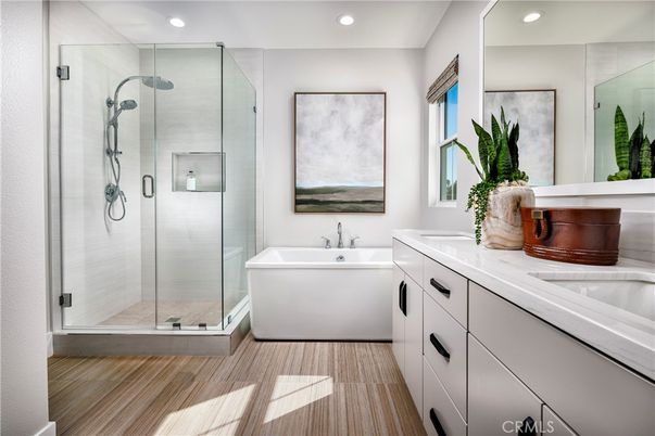 Bathroom, Dual Sink Vanities, Free Standing Baths, Glass Shower, Interior, Recessed Lighting, Wood Texture Flooring