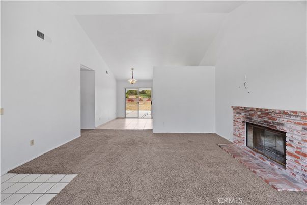 Chandelier, Empty room, Fireplace, Interior