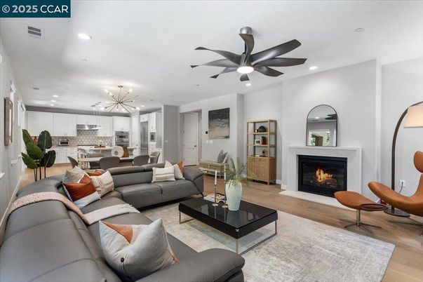 Dining room, Fireplace, Interior, Kitchen, Living room, Pendant Lights, Recessed Lighting, Stainless Steel Appliances, Wood Texture Flooring