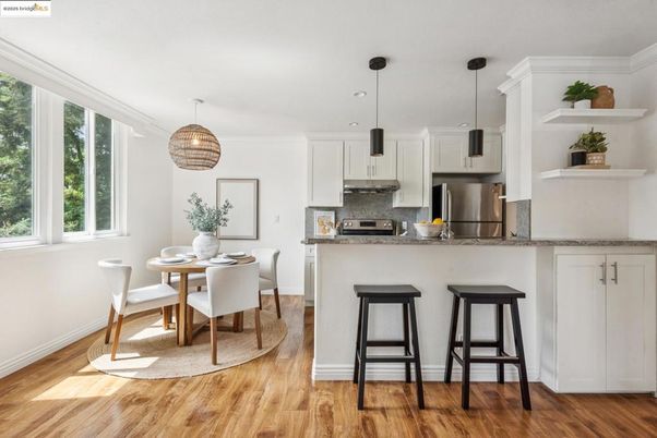 Dining room, Interior, Kitchen, Pendant Lights, Recessed Lighting, Stainless Steel Appliances, Wood Texture Flooring