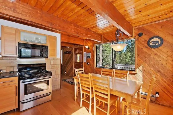 Dining room, Interior, Kitchen, Pendant Lights, Stainless Steel Appliances, Wooden Beams, Wooden Ceilings, Wood Texture Flooring, Wooden Walls