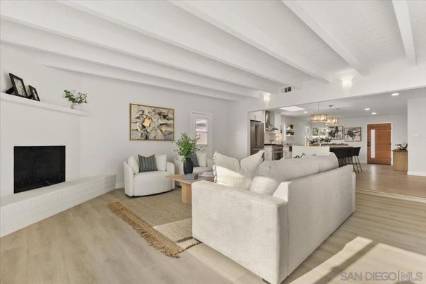 Chandelier, Dining room, Fireplace, Interior, Kitchen, Living room, Pendant Lights, Recessed Lighting, Stainless Steel Appliances, Wood Texture Flooring