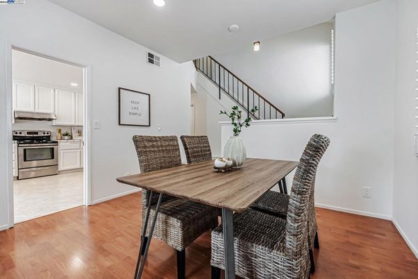 Dining room, Interior, Kitchen, Recessed Lighting, Stainless Steel Appliances, Wood Texture Flooring