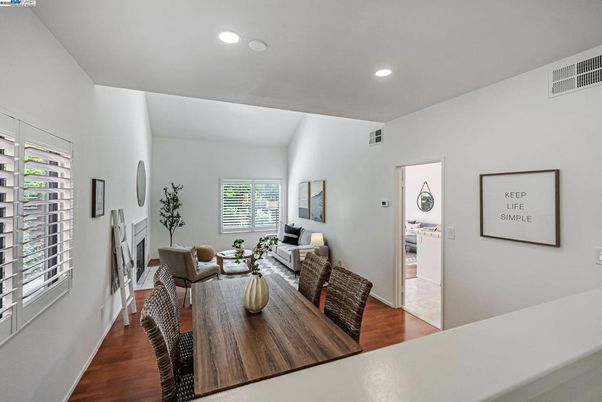 Dining room, Fireplace, Interior, Living room, Recessed Lighting, Wood Texture Flooring