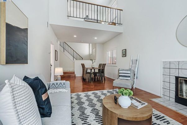 Dining room, Fireplace, Interior, Living room, Recessed Lighting, Wood Texture Flooring