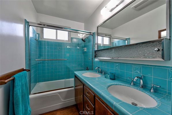 Bathroom, Dual Sink Vanities, Glass Shower, Interior, Tile Countertops, Wood Texture Flooring