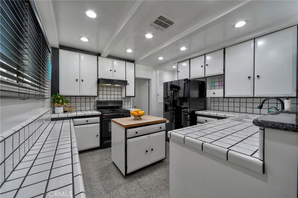 Interior, Kitchen, Recessed Lighting, Tile Countertops