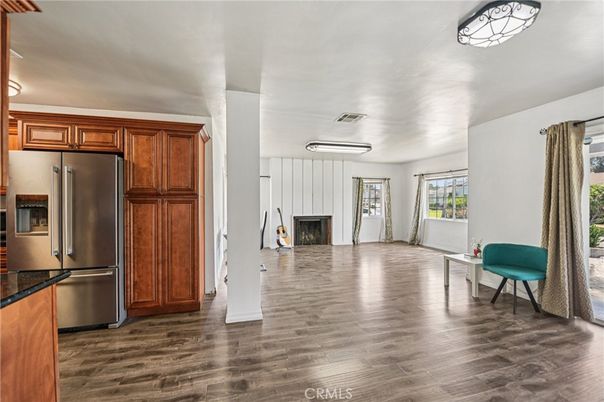 Fireplace, Interior, Kitchen, Stainless Steel Appliances, Wood Texture Flooring