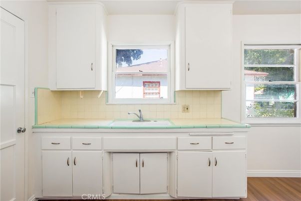 Interior, Kitchen, Tile Countertops, Wood Texture Flooring