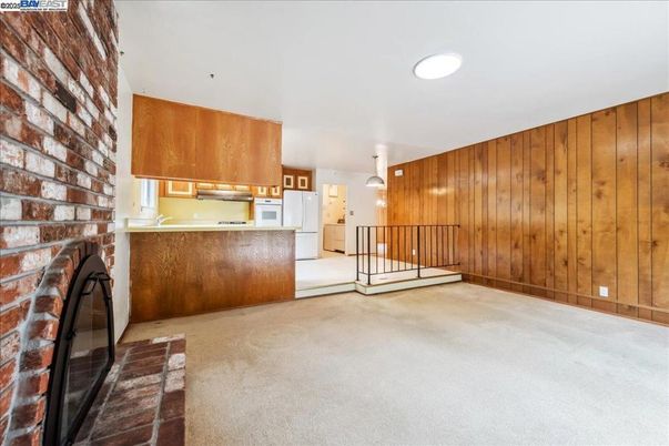 Empty room, Fireplace, Interior, Pendant Lights, Recessed Lighting, Washer, Wooden Walls