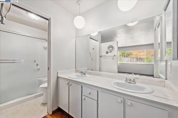 Bathroom, Dual Sink Vanities, Glass Shower, Interior, Pendant Lights