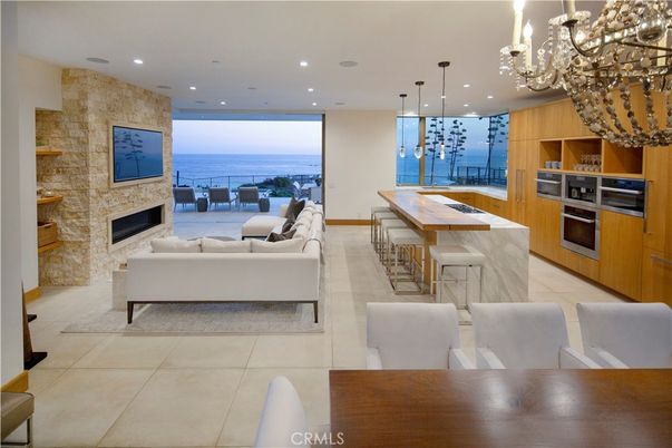 Chandelier, Dining room, Fireplace, Interior, Kitchen, Living room, Pendant Lights, Recessed Lighting, Stone Walls, Water