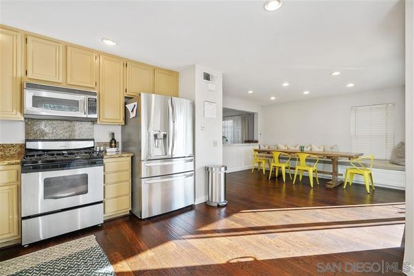 Dining room, Interior, Kitchen, Recessed Lighting, Stainless Steel Appliances, Wood Texture Flooring