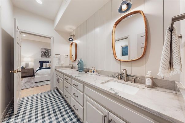 Bathroom, Dual Sink Vanities, Glass Shower, Interior, Recessed Lighting, Wood Texture Flooring