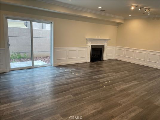 Empty room, Fireplace, Interior, Recessed Lighting, Wood Texture Flooring