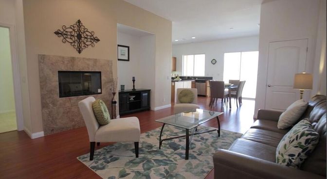 Dining room, Fireplace, Interior, Living room, Recessed Lighting, Wood Texture Flooring