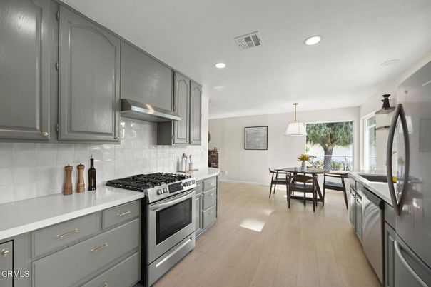 Dining room, Interior, Kitchen, Pendant Lights, Recessed Lighting, Stainless Steel Appliances, Wood Texture Flooring