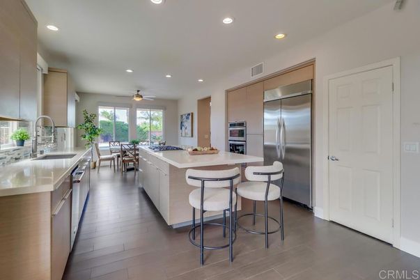 Dining room, Interior, Kitchen, Recessed Lighting, Stainless Steel Appliances, Wood Texture Flooring