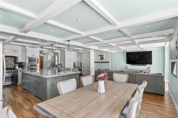 Dining room, Interior, Kitchen, Living room, Recessed Lighting, Stainless Steel Appliances, Wood Texture Flooring